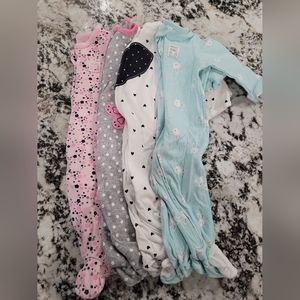Bundle of 4 Carter's pajamas/one piece footies 6 months